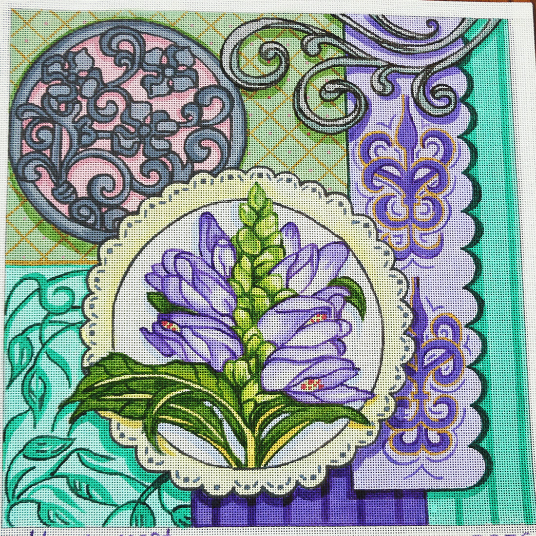 R936 Purple flower w/ green and patchwork background