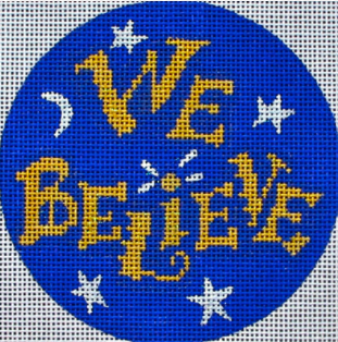 DC designs round needlepoint canvas of the phrase "we believe" in gold with stars and moon in the background