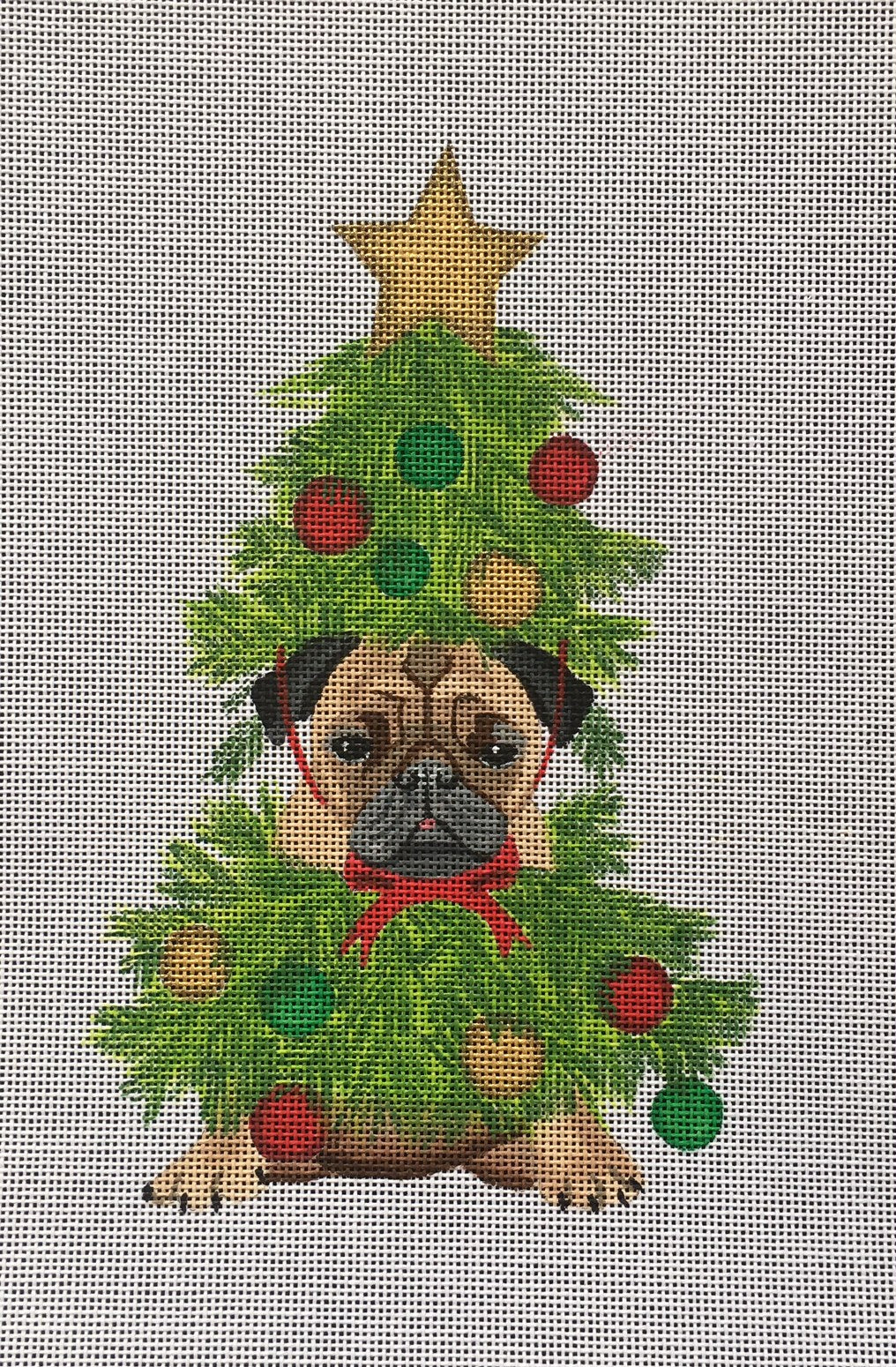 whimsical needlepoint canvas of a pug wearing a Christmas tree costume
