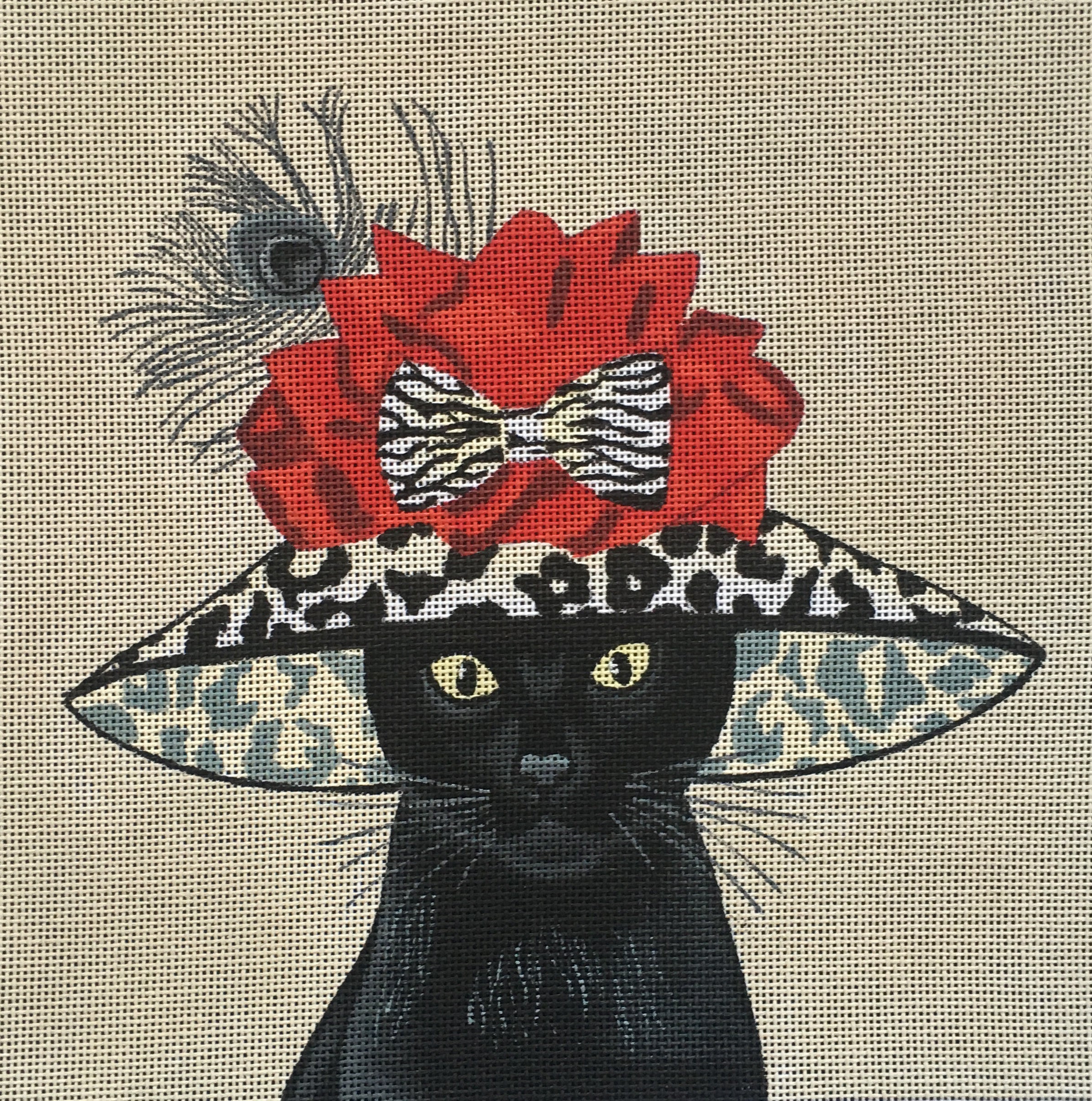 Fab Funky whimsical needlepoint canvas of a black cat wearing a large leopard print hat with a bow and a peacock feather