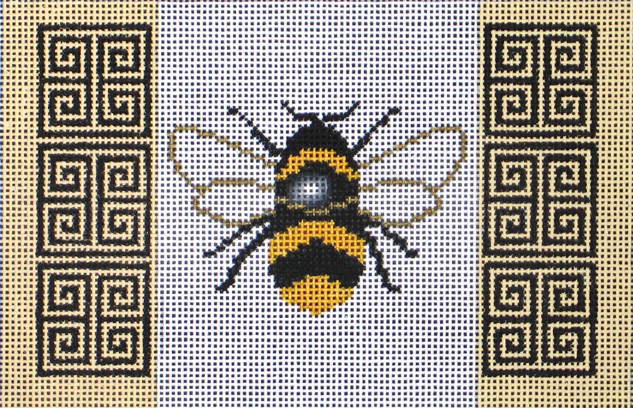DC designs needlepoint canvas of bumblebee with geometric trim
