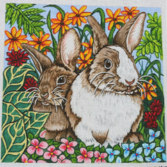 R945 Bunnies in a spring field