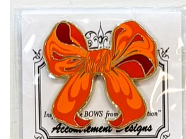 Large Orange  Bow needle minder by Accoutrement Designs